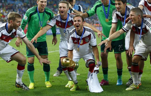 Germany's Mario Goetze lifts the World Cup trophy after the 2014 World Cup final against Argentina at the Maracana stadium in Rio de Janeiro